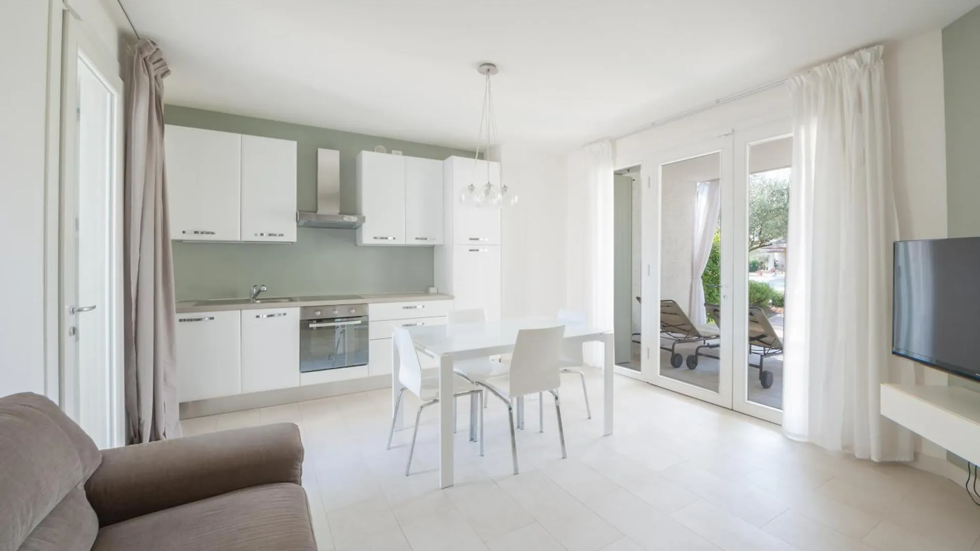 Villaggio Les Maisons - Immobiliare Pacella Lido di Jesolo Italië
