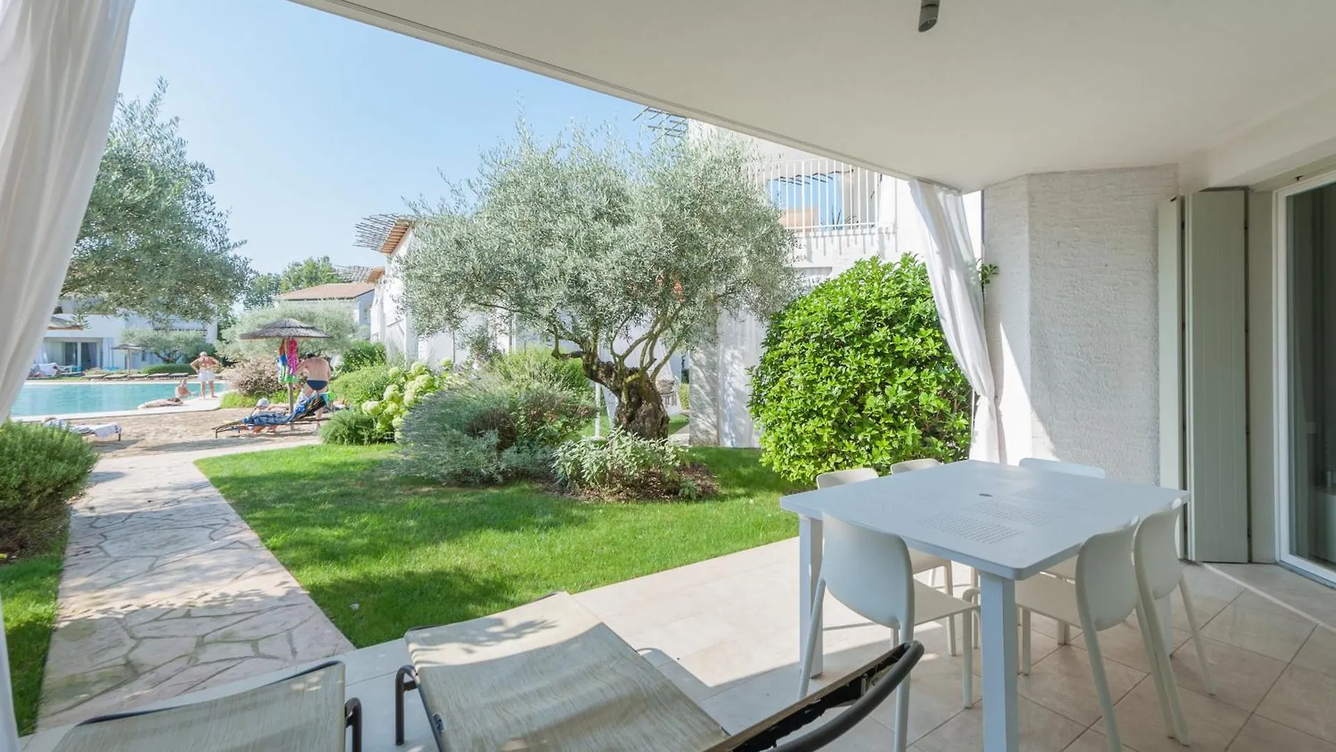Appartement Villaggio Les Maisons - Immobiliare Pacella Lido di Jesolo Italië